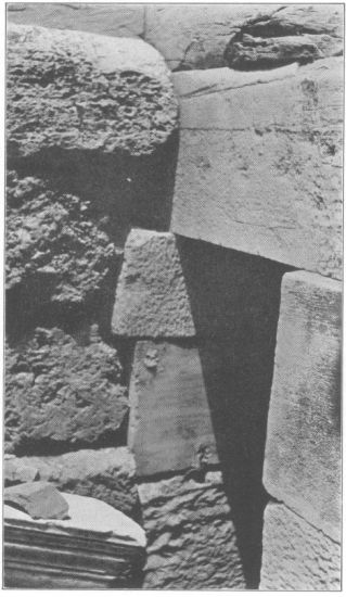 Figure 6

View of N. end of W. interior foundation showing that it does not key
into the foundation of the N. wall