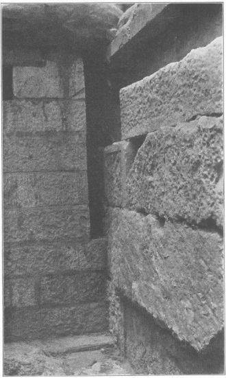Figure 11

The interior N.W. corner of the Erechtheum. Modern masonry under N. end
of W. wall