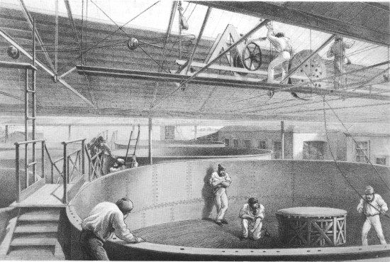 R. M. Bryson, lith from a drawing by R. Dudley

London, Day & Sons, Limited, Lith.

COILING THE CABLE IN THE LARGE TANKS AT THE WORKS AT GREENWICH.